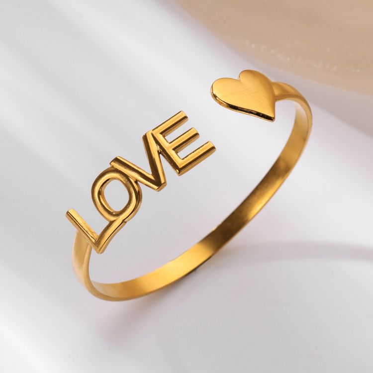Immagine di Gold-Tone Open Bangle Bracelet With Love And Heart Design 1