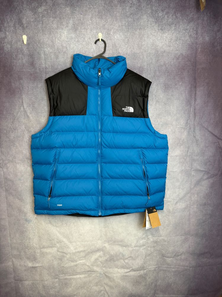 The North Face blue and black puffer vest