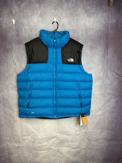 The North Face blue and black puffer vest