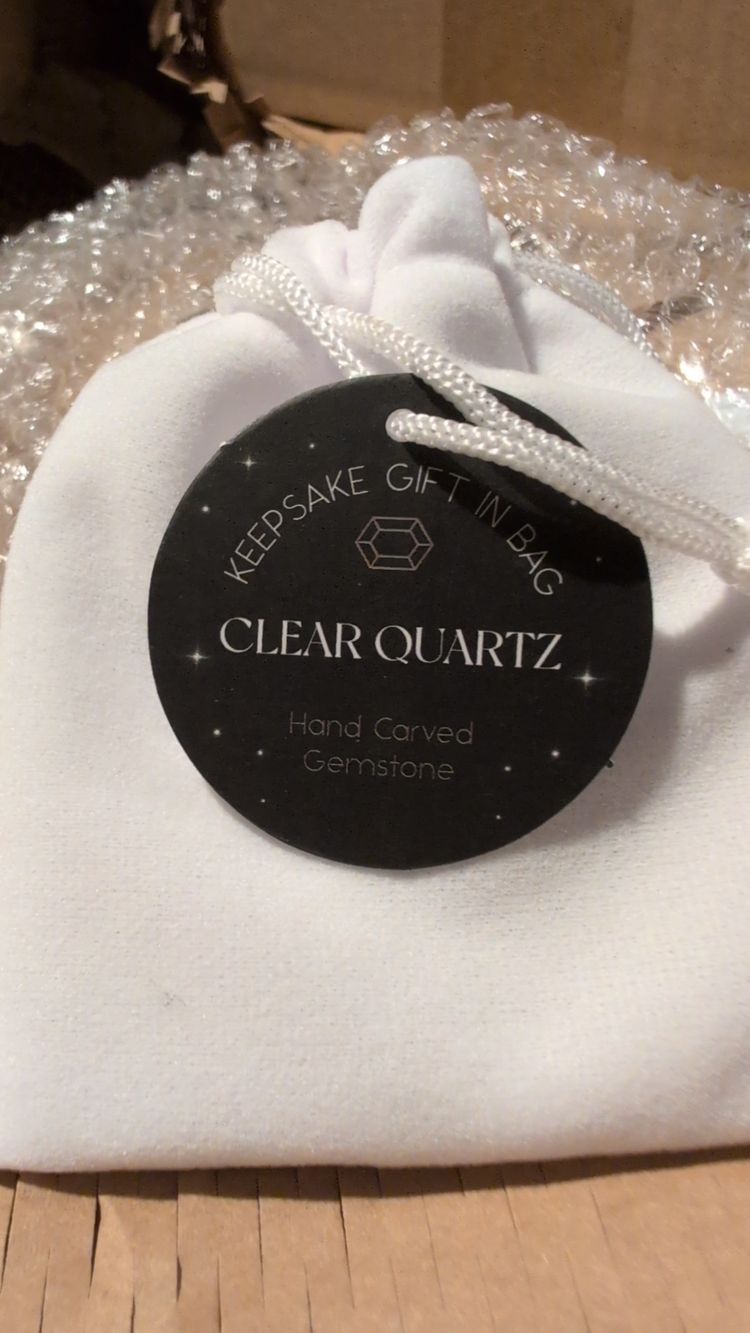 clear quartz hand carved gemstone