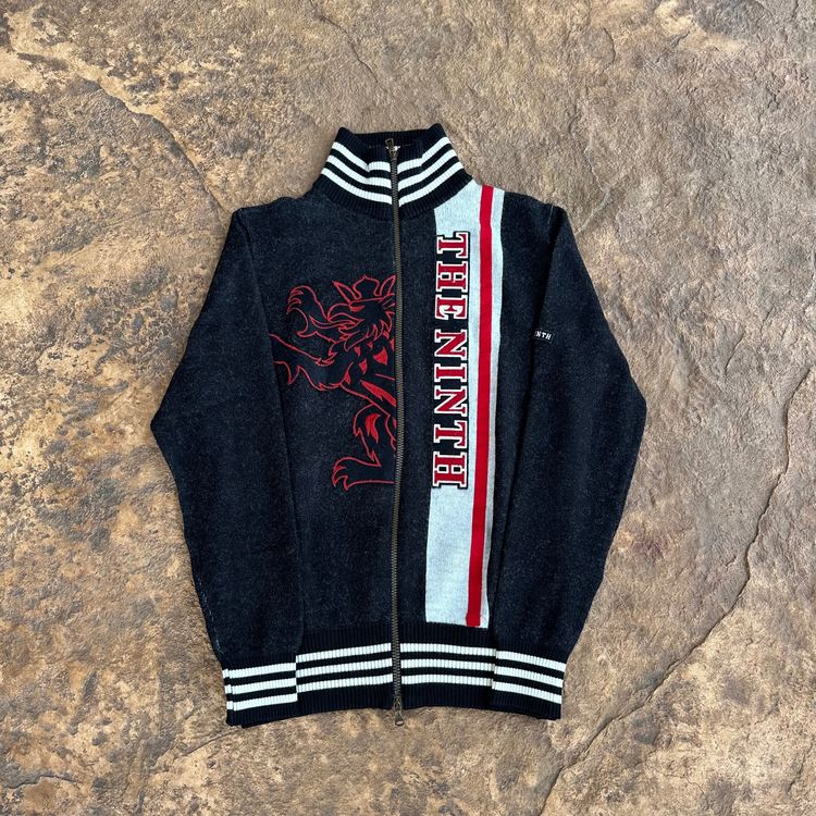 Black Zip-Up Sweater With Striped Collar And Hem