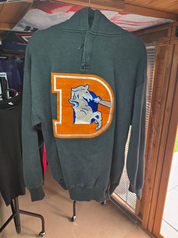 hoodie with large letter D and horse logo