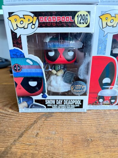 Snow Day Deadpool Funko Pop Figure slight damage to box