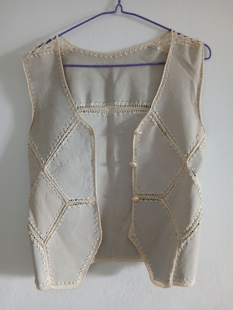 crocheted beige vest