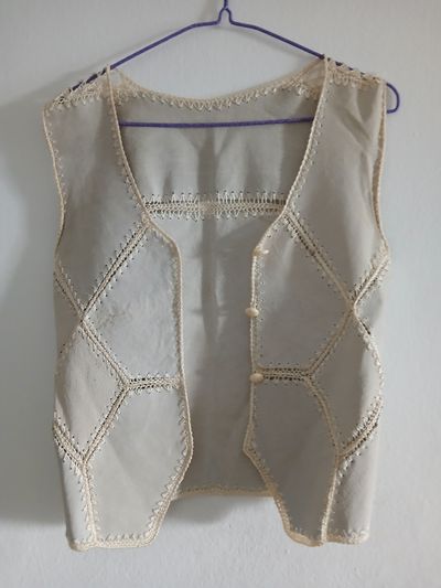 crocheted beige vest