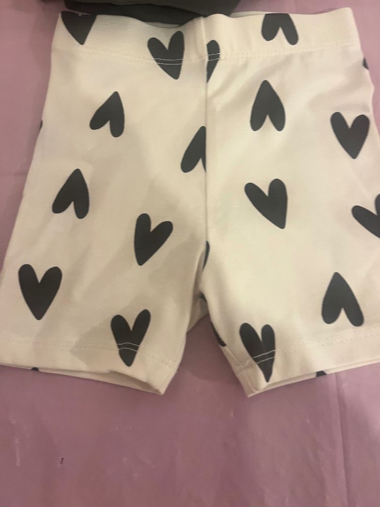 Black T-Shirt With Heart Print And White Shorts With Black Hearts