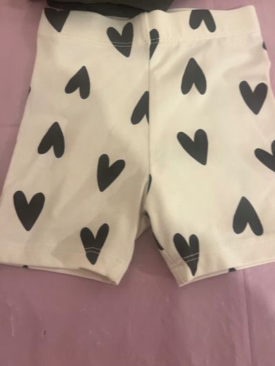 Black T-Shirt With Heart Print And White Shorts With Black Hearts