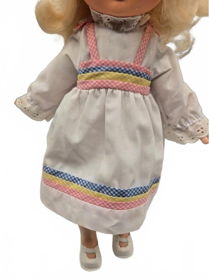 Blonde Doll In White Dress With Colorful Trim image 3