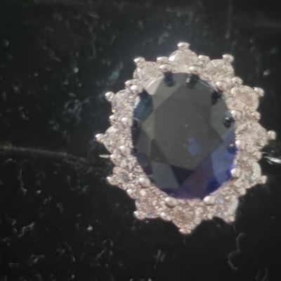 Silver Ring With Blue Gemstone And Clear Stones