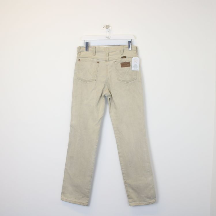 World Vintage Vintage Wrangler Jeans in sand. Best fit W32 L34 product image