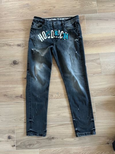 Black Distressed Jeans With Hoodrich Text