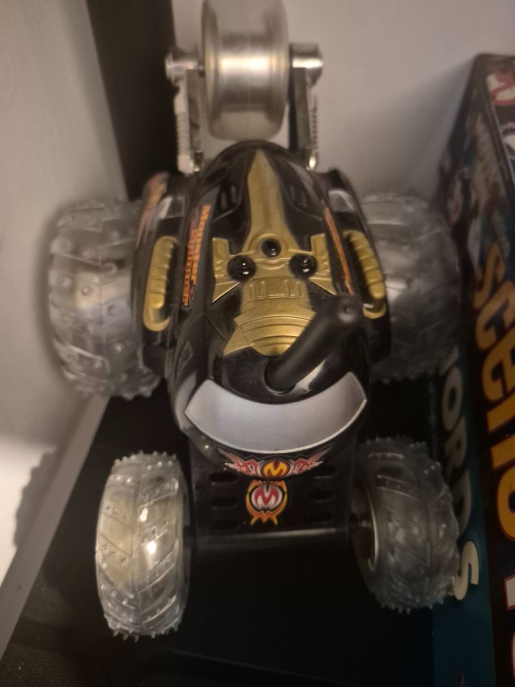 Other black and gold toy vehicle untested product image