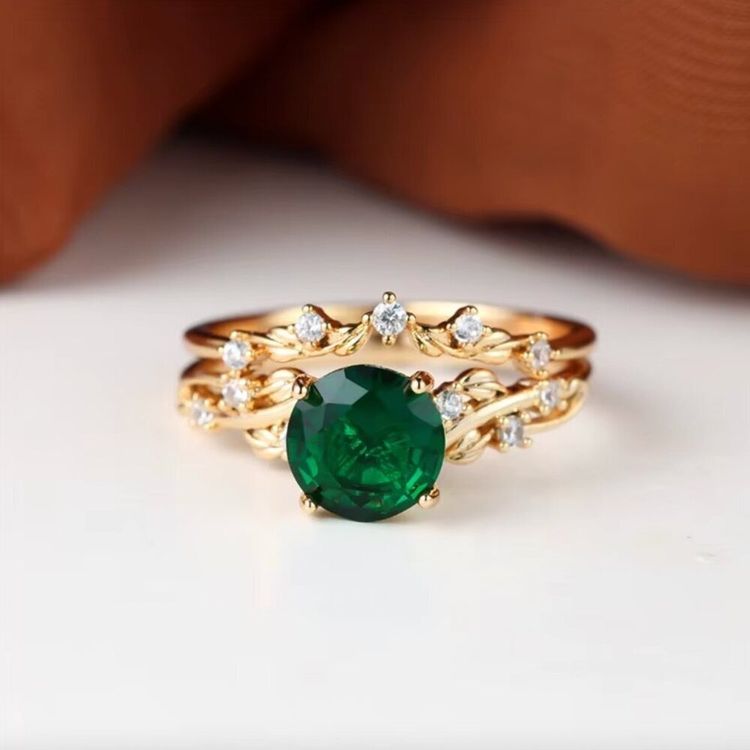 Gold Ring With Green Gemstone And Small Clear Stones image 2