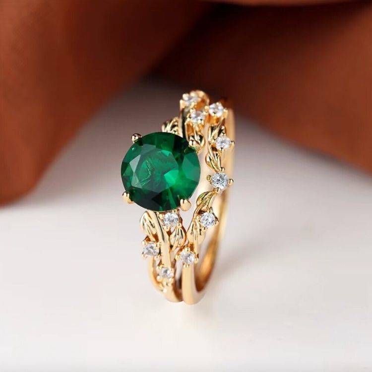 Gold Ring With Green Gemstone And Small Clear Stones image 3