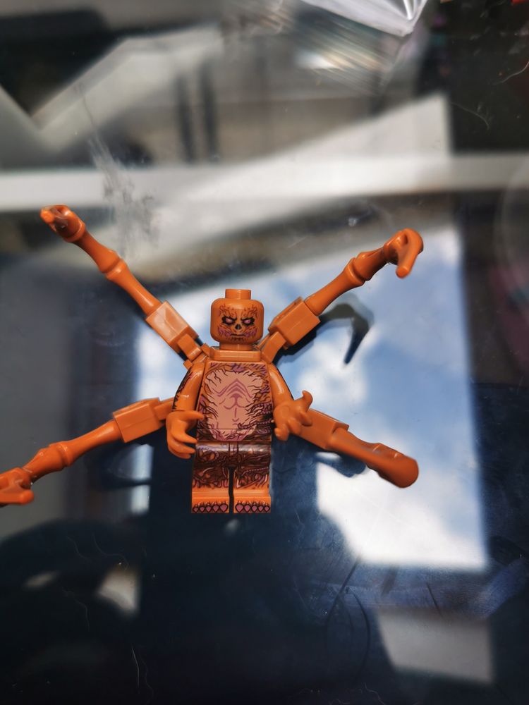 Brown Spider-Like Toy Figure With Multiple Arms