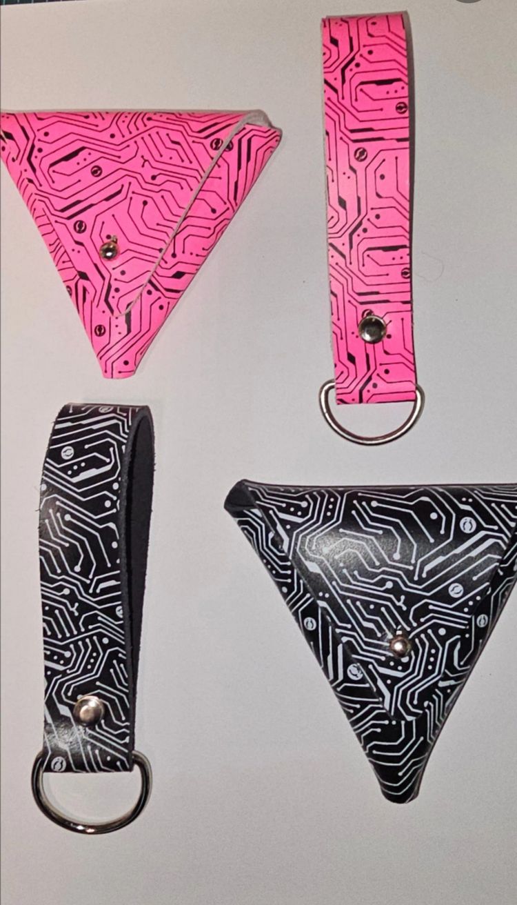 pink and black circuit pattern key holders