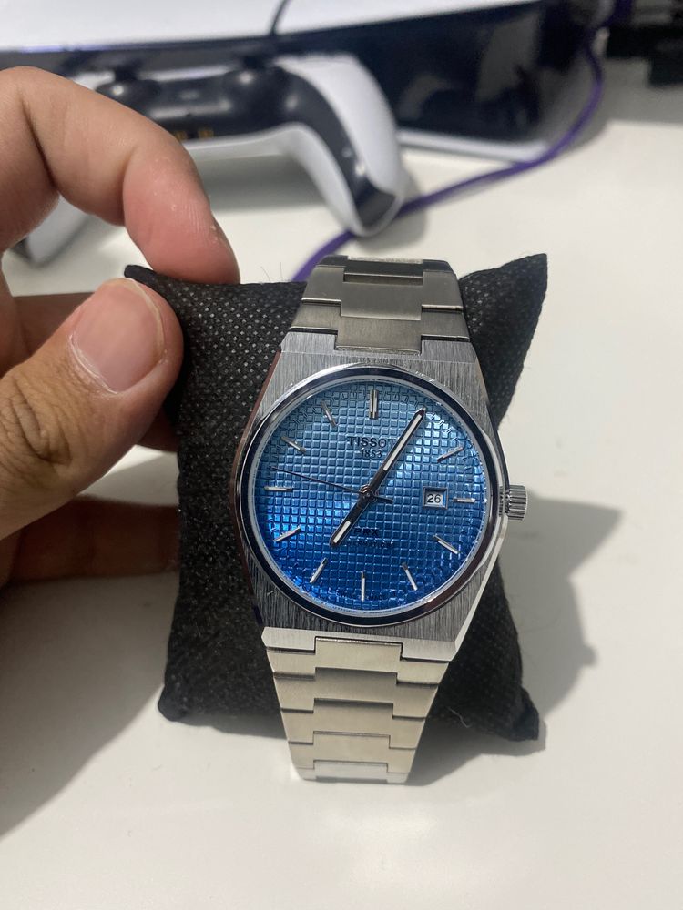 Silver Wristwatch With Blue Dial