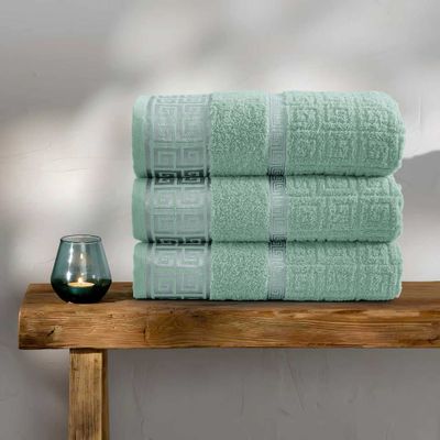 Stack Of Three Green Towels