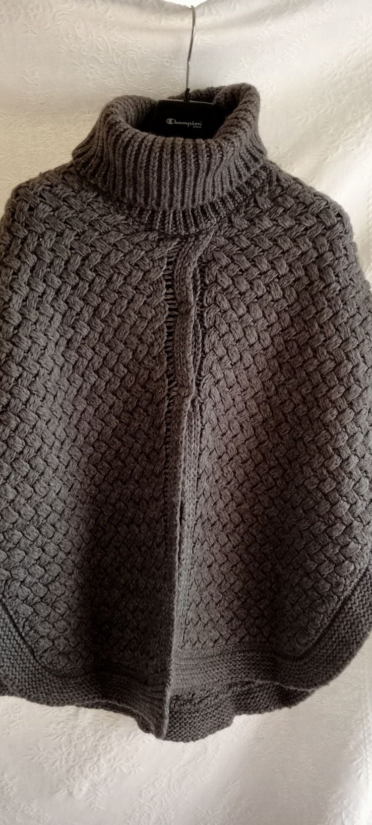 Other  knitted turtleneck poncho grigio  product image