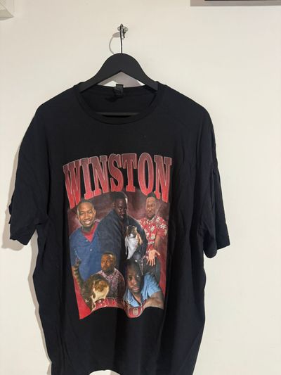 black graphic T-shirt with WINSTON print and group image