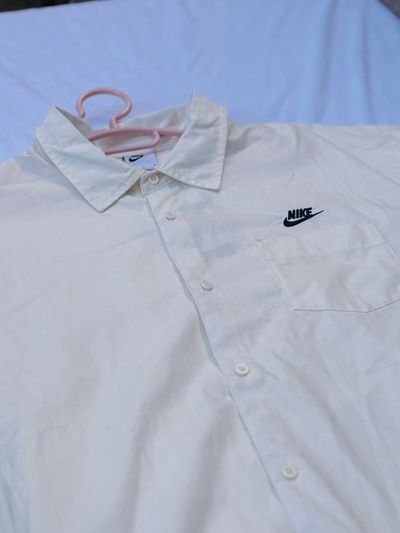 Nike white short sleeve button-up shirt