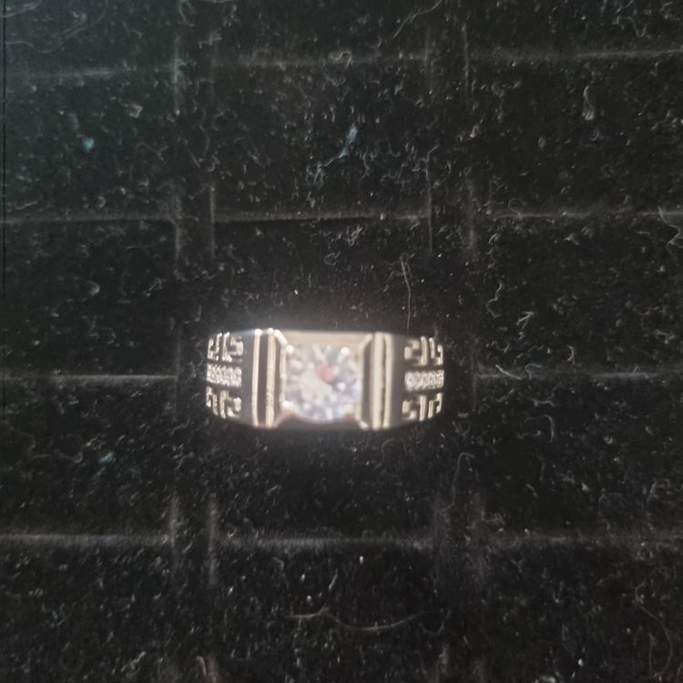 Silver Ring With Clear Stone And Engraved Pattern