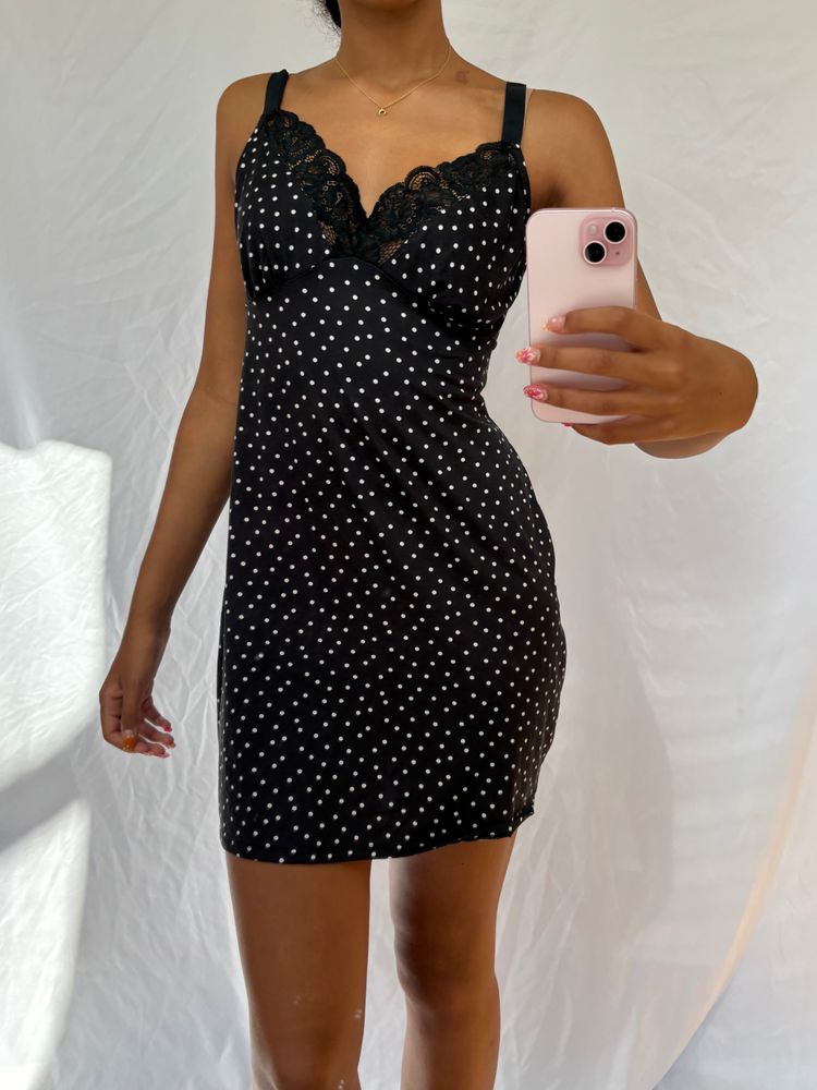black polka dot slip dress with lace trim