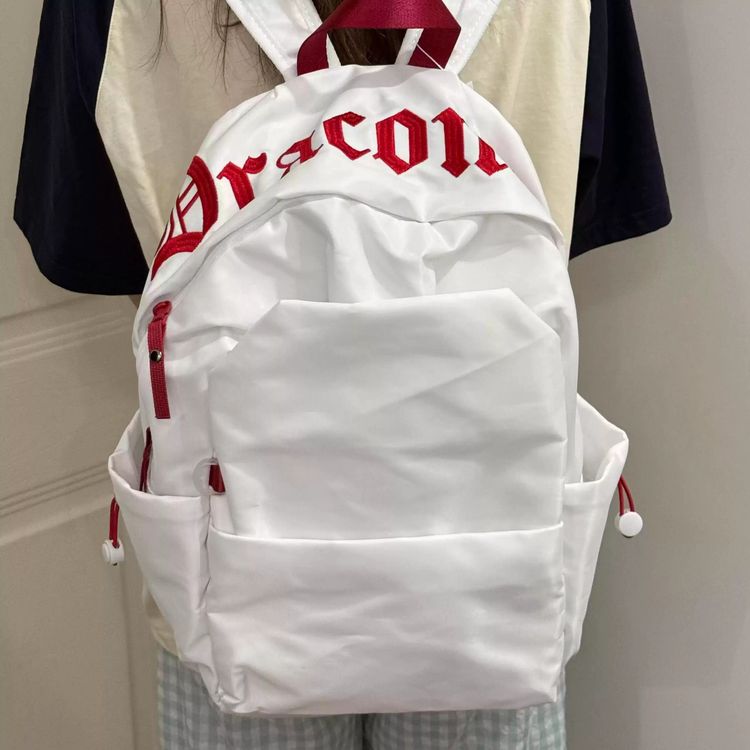 White Backpack With Red Text image 1