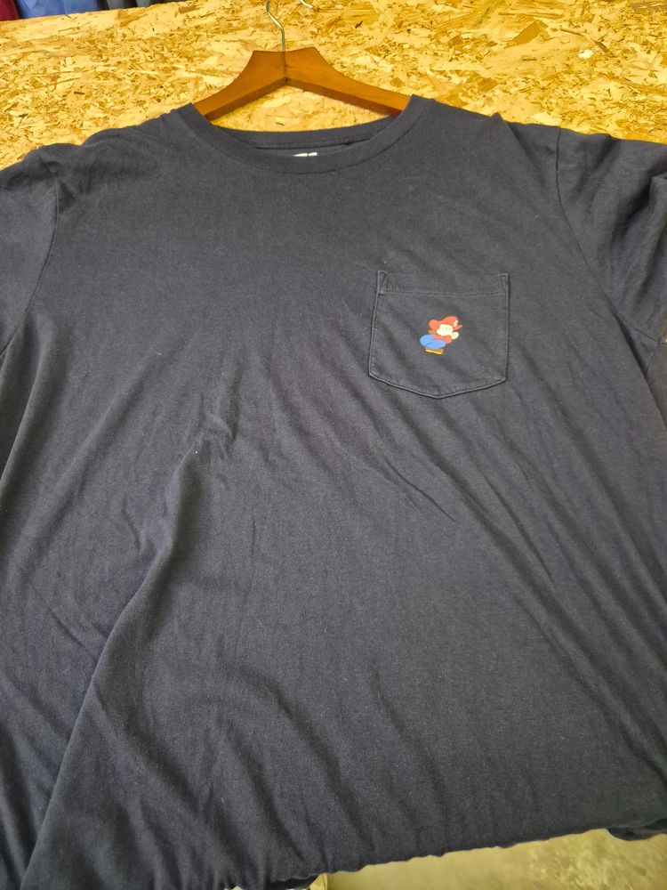 On Running Black T-Shirt With Small Mario Graphic On Pocket product image