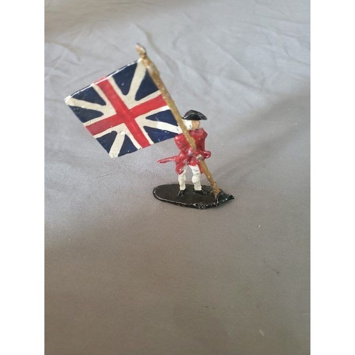 Miniature Soldier Figurine With British Flag image 1