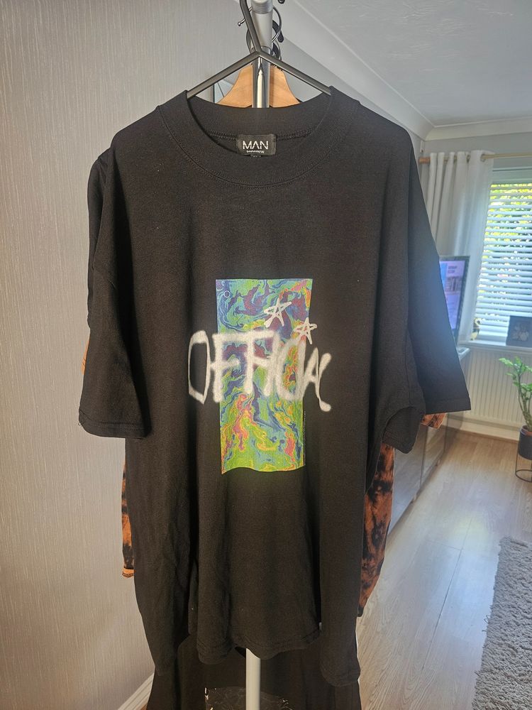 Man Black T-Shirt With Colorful Official Print