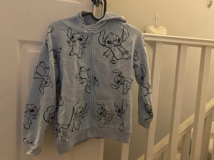 Light Blue Zip-Up Hoodie With Cartoon Character Print image 1