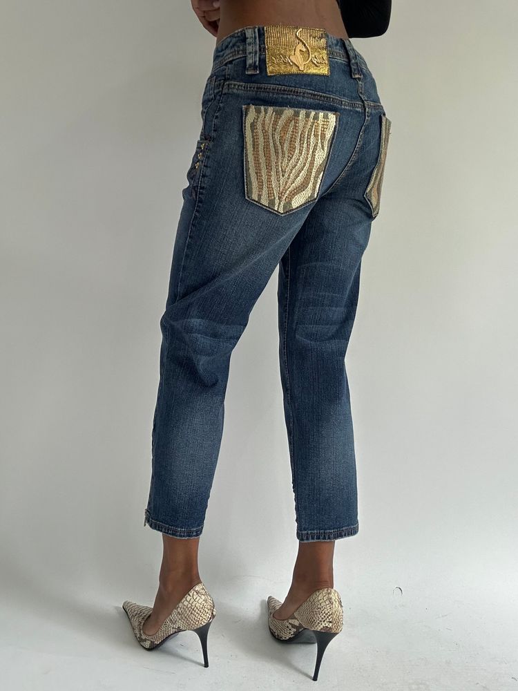 euro trash | medium baby phat blue denim cropped jeans with gold zebra detail pockets