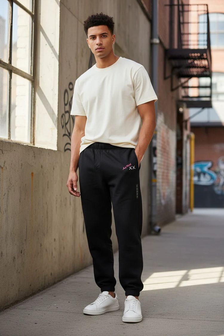 RARE Uniqlo KAWS + Warhol sweatpants black size Large (Last one)