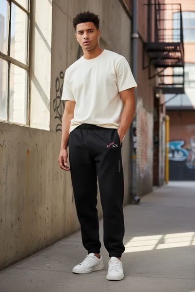 RARE Uniqlo KAWS + Warhol sweatpants black size Large (Last one)