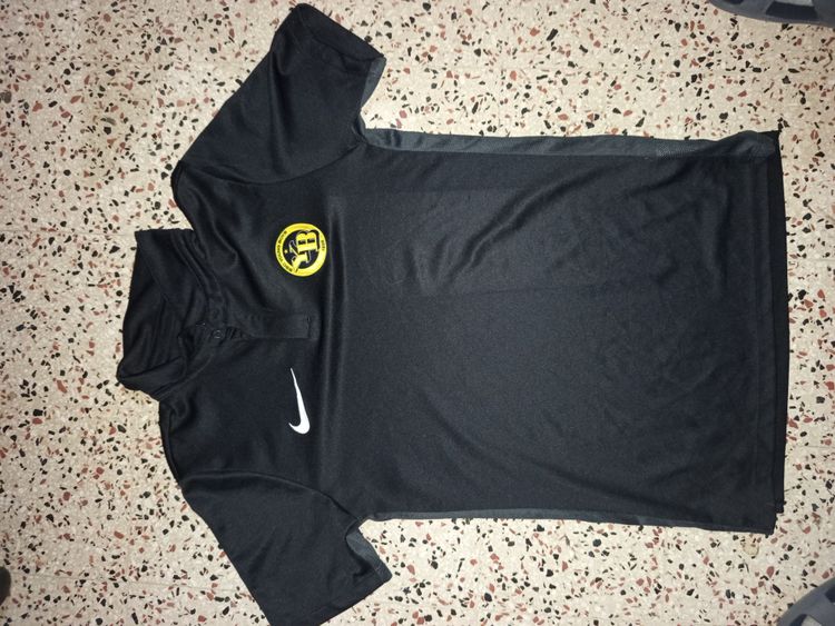 Nike Black Polo Shirt With Yellow Logo