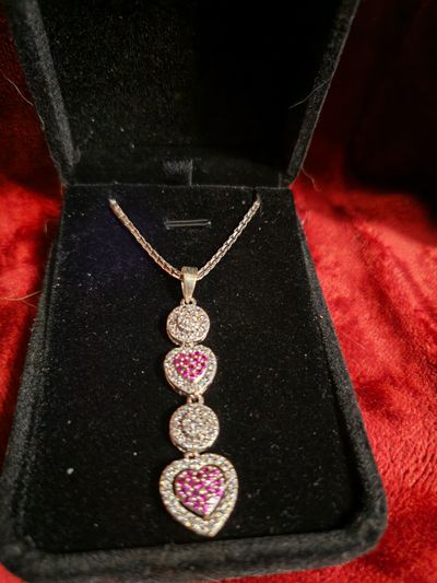 Silver Necklace With Heart-Shaped And Round Pendants 1
