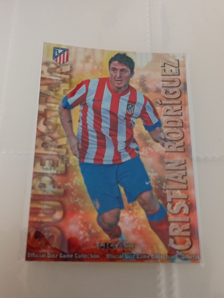 Panini Ref A1-P17. Cristian Rodríguez. Atlético de Madrid. Mundicromo 2013. Superstar especial rayas diagonales holográfica  product image