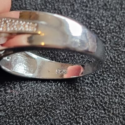 Silver Ring With Blue Gemstone And Small Clear Stones