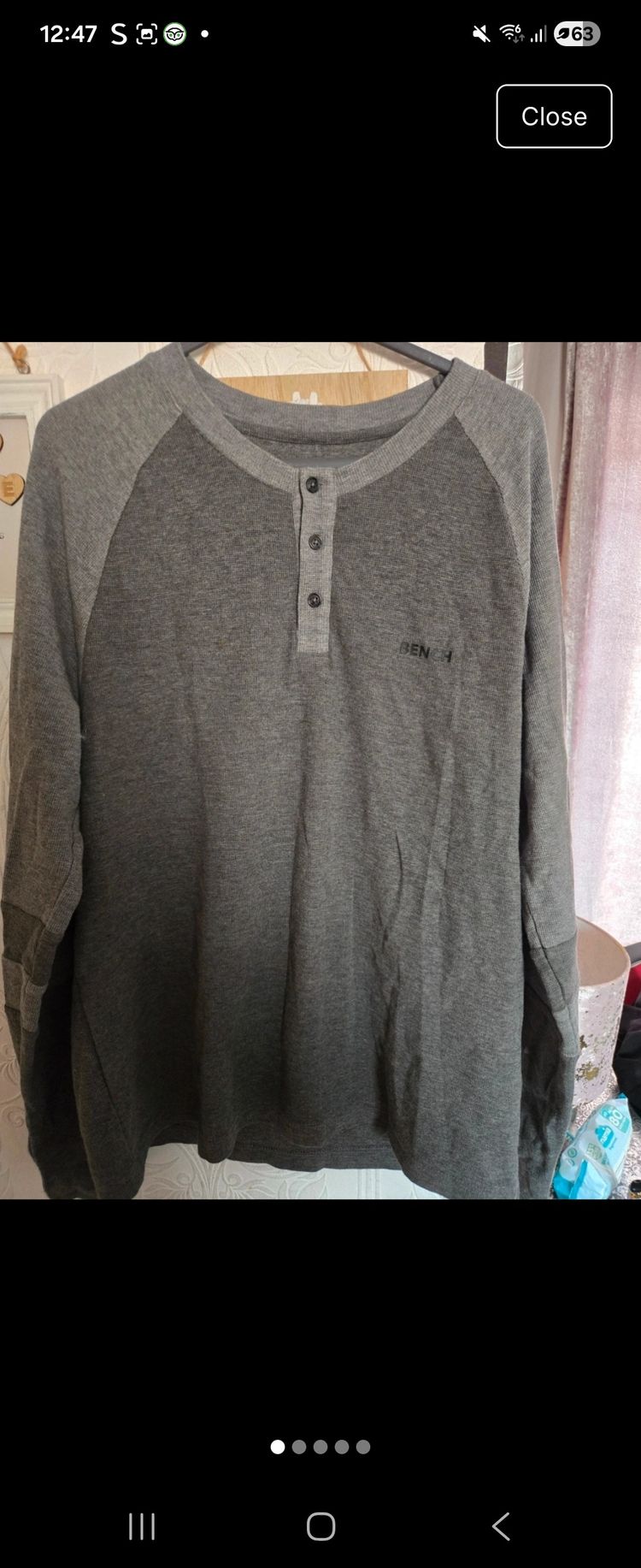 Bench. grey shirt