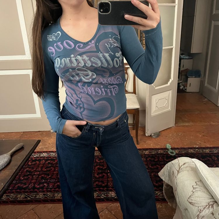 Other blue long sleeve V-neck top with graphic text product image