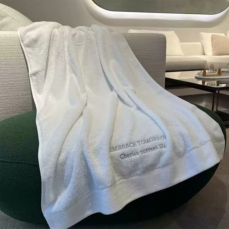 White Towel With Embroidered Text image 1