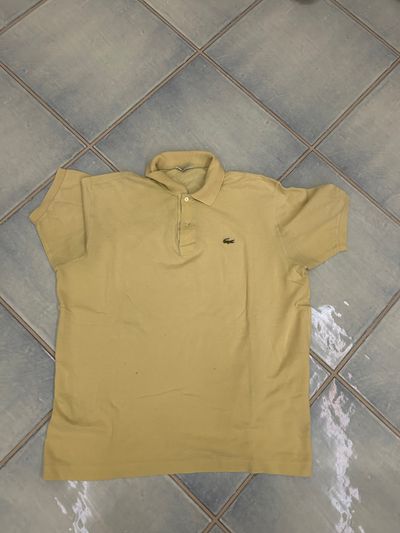 Lacoste yellow polo shirt