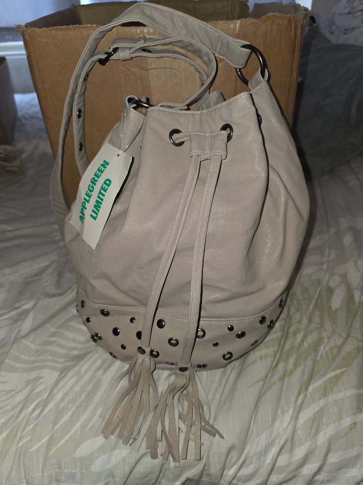Beige Bucket Bag With Tassels And Studs image 1