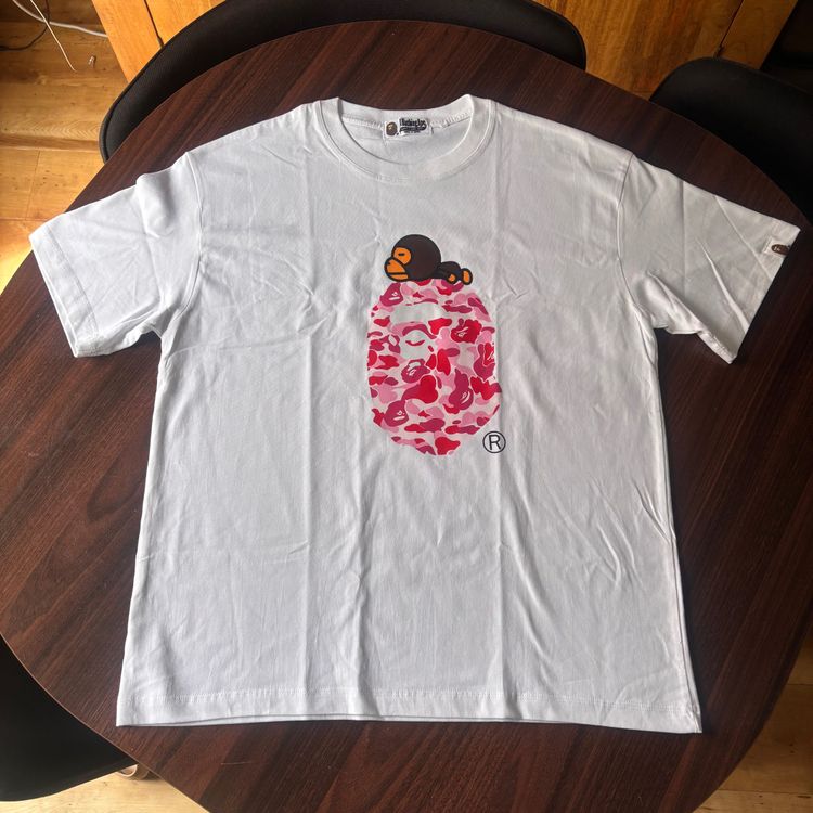 A Bathing Ape White T-Shirt With Pink Camo Ape Head Graphic