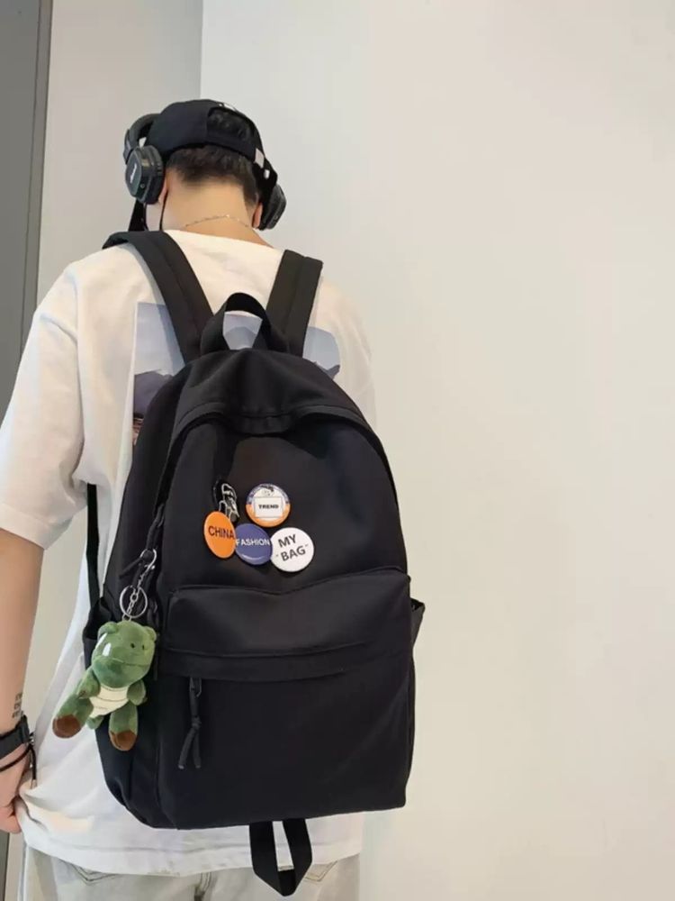 Black Backpack With Pins And Plush Keychain image 3
