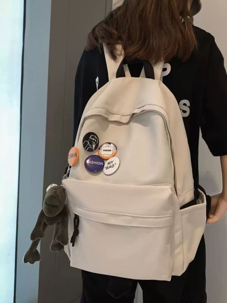 Black Backpack With Pins And Plush Keychain image 4