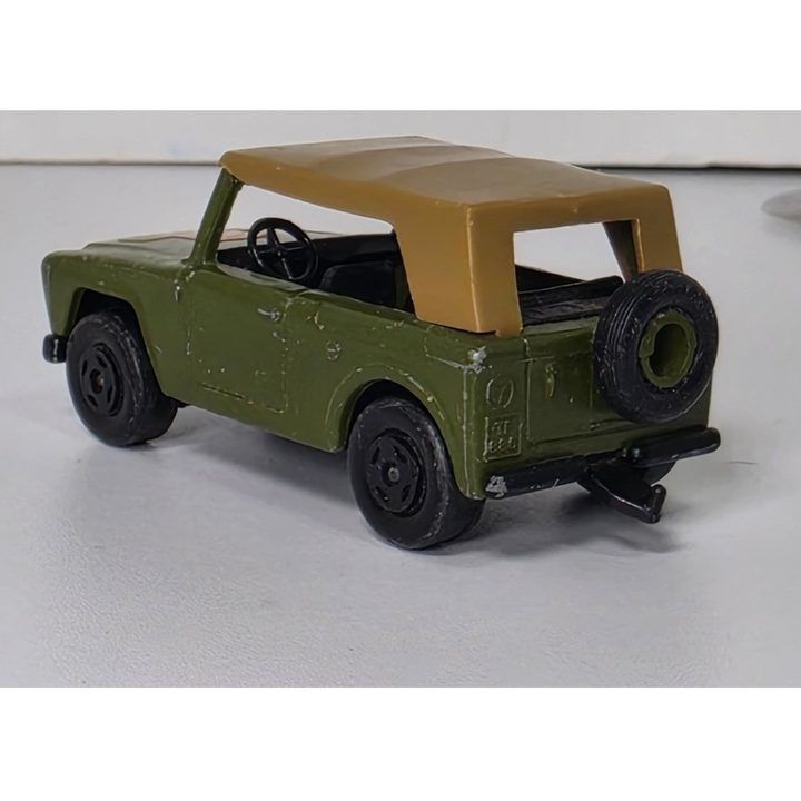 Green Toy Car With Tan Roof image 3