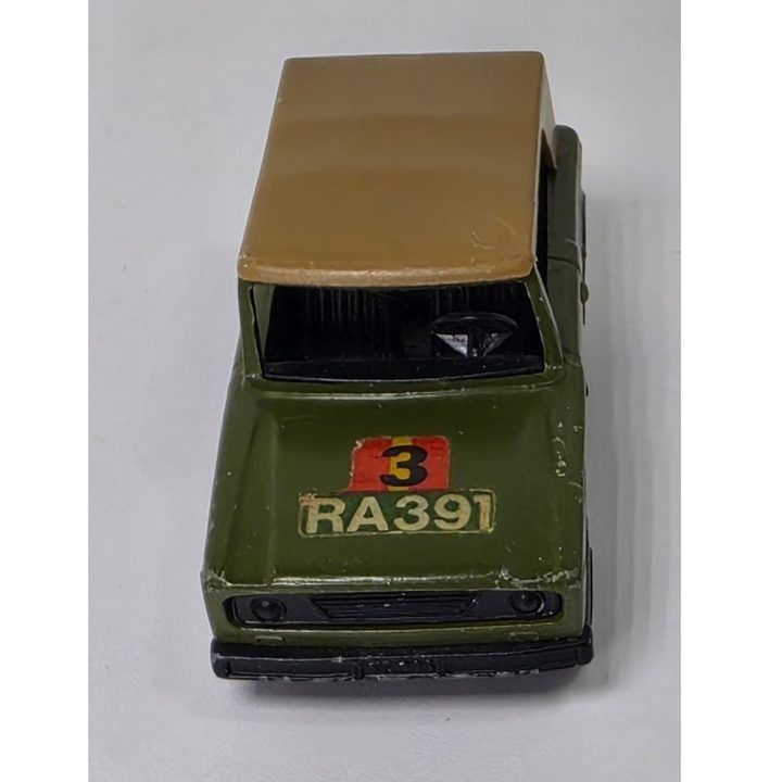 Green Toy Car With Tan Roof image 1