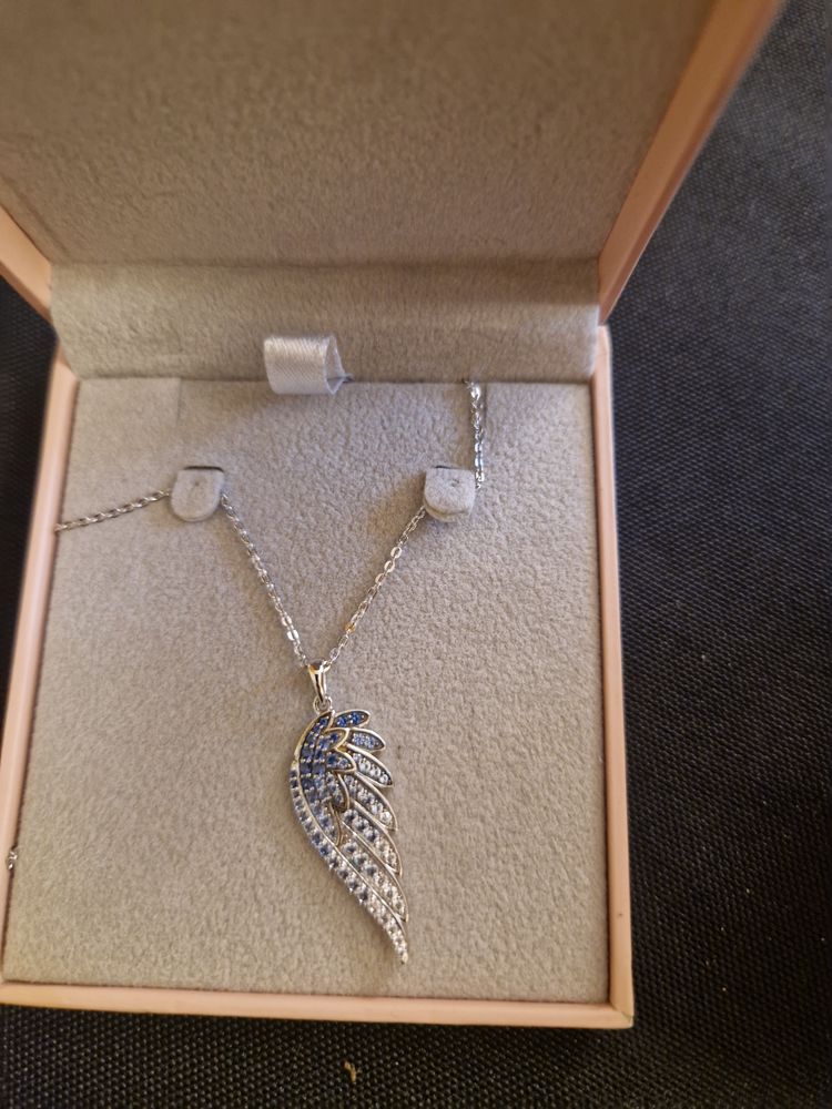 Silver Necklace With Wing-Shaped Pendant